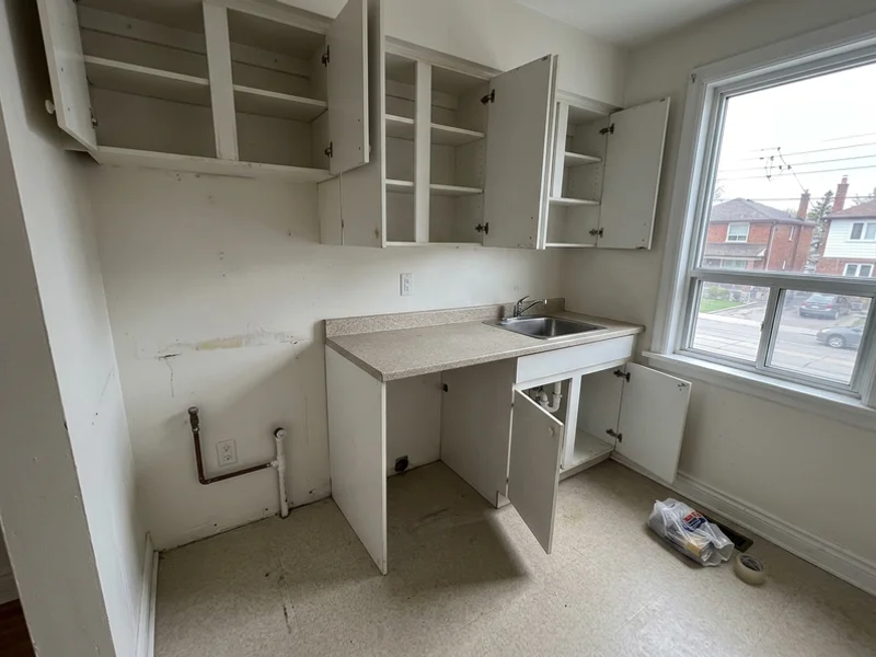 Cleared rental kitchen ready for handover