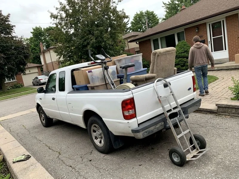 Truck loaded with cleared basement contents