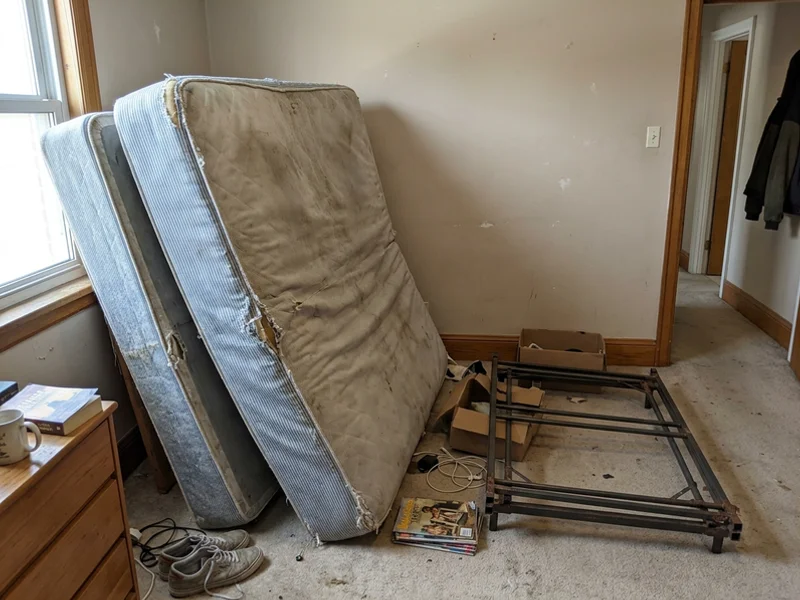 Old mattress and box spring ready for collection