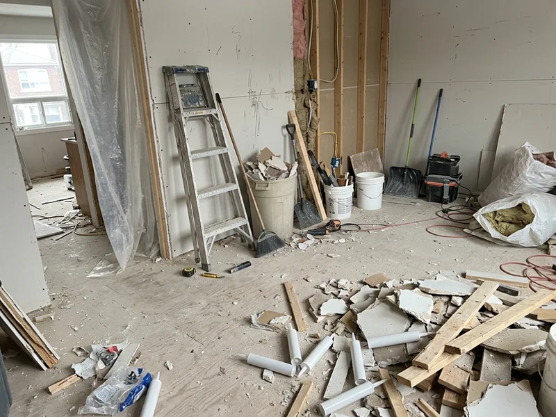 Renovation site strewn with debris before cleanup